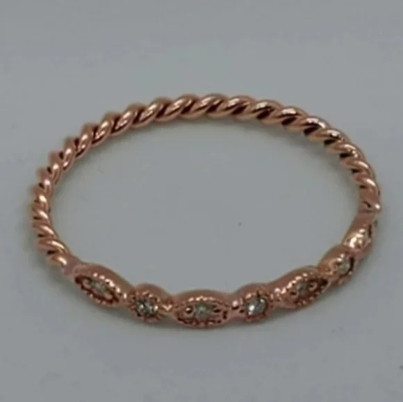 14K ROSE TWISTED RING WITH 7 DIAMONDS AND ENGAGEMENT MILIGREEN DESIGN